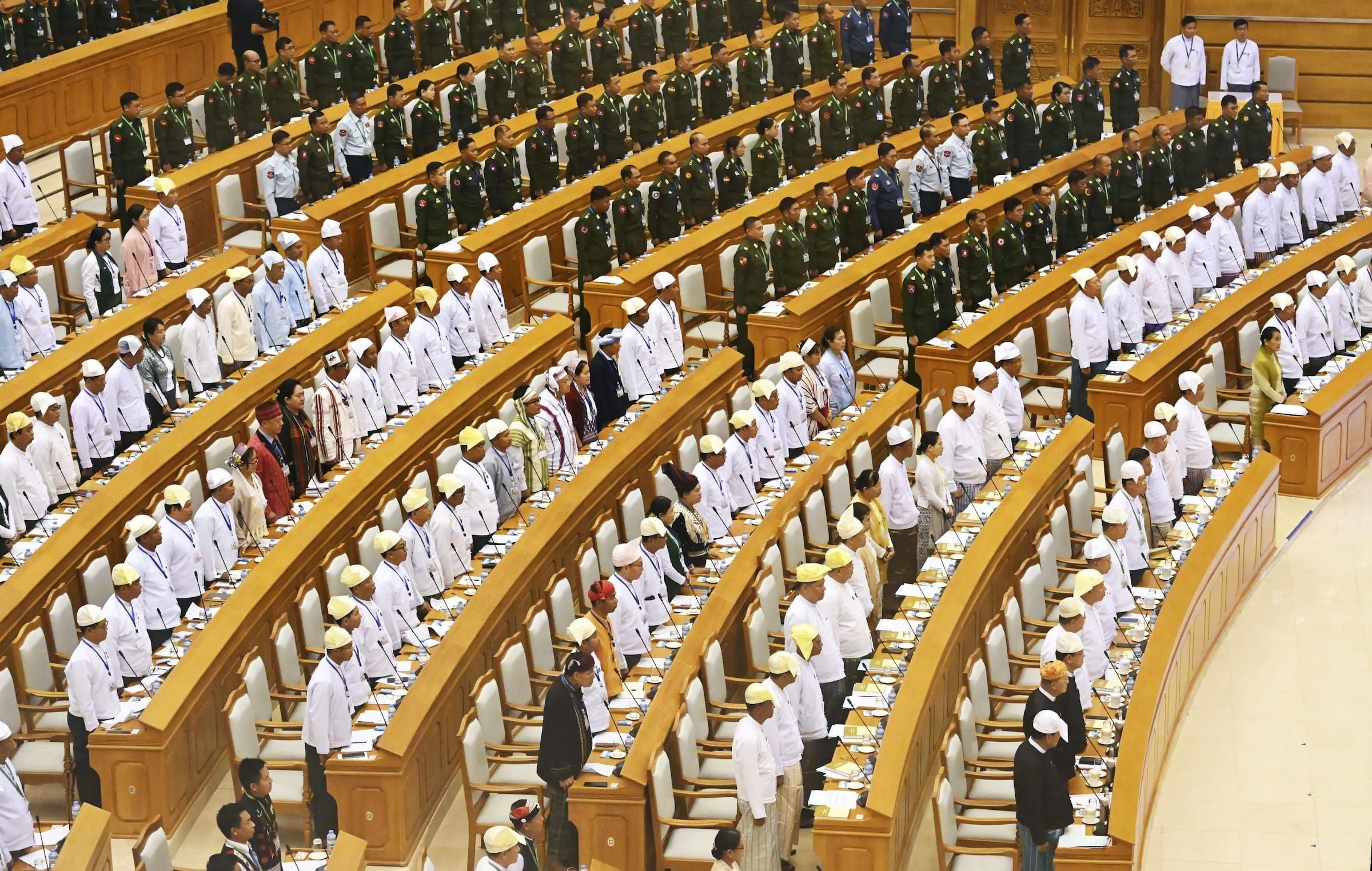 Newly elected parliamentarians and military appointees attend Min Aung Hlaing’s swearing-in ceremony at parliament in Naypyidaw, 10 April 2026. (Kyodo via AP Images)